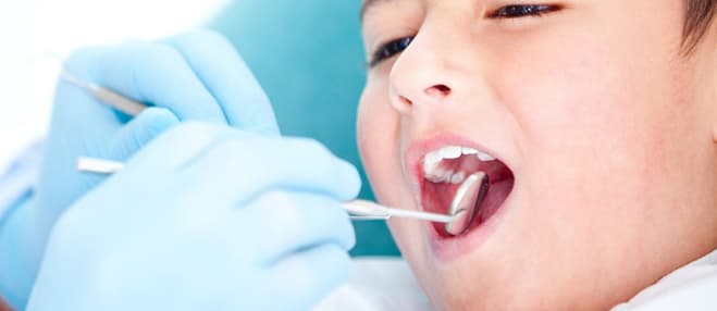 Фторирование зубов детям